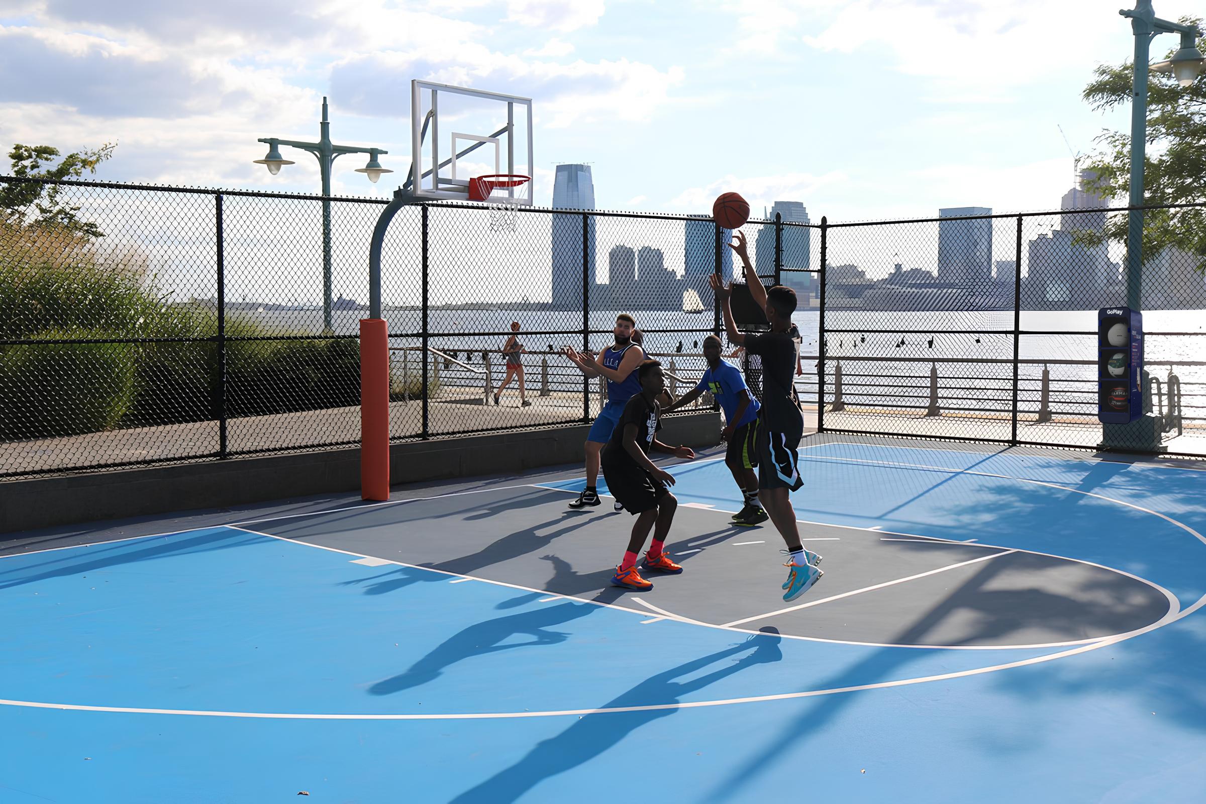 People playing at a public court in New York City